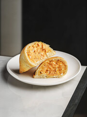 empanadas on a plate on a table in a restaurant