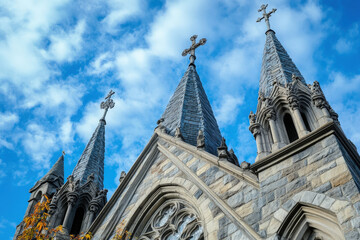 Obraz premium Gothic Cathedral Spires Against Blue Sky