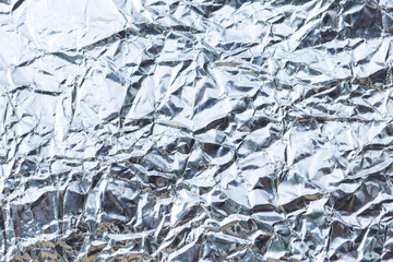 Abstract crumpled silver paper texture background, blank wrinkle paper pattern background