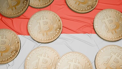 Several bitcoins are laid out on the flag of Indonesia