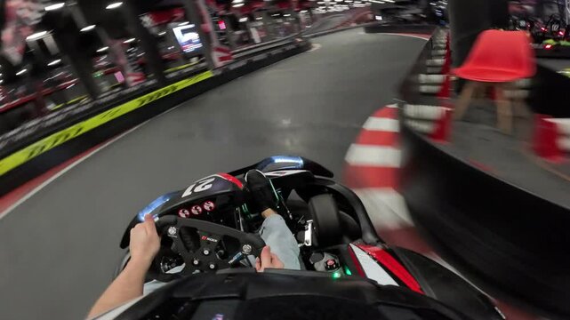 See POV kart racing on the karting track. Kart driving. Karting driving point of view. Drivers driving karts on a race track. First person view of the steering