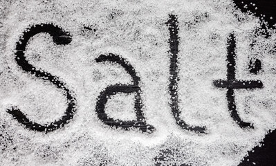 The inscription salt on the surface of salt. table salt.