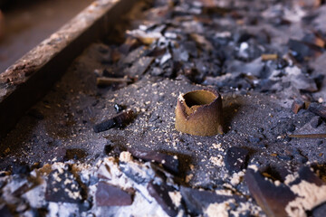 Remains of knocked out casting molds in the workshop of metallurgical plant