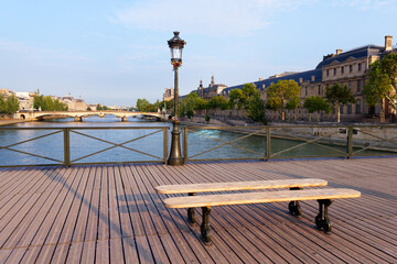 Public bench  of the Pont des Arts bridge in Paris city