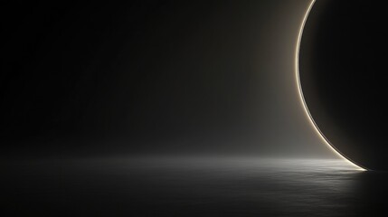 Obraz premium Elegant black wallpaper with a gentle gradient, suggesting the edge of a solar eclipse, complemented by a soft glow along the horizon, evoking calm and mystery
