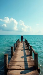 Fototapeta premium Solitary figure, weathered pier, vast ocean expanse, ocean, sunset, horizon