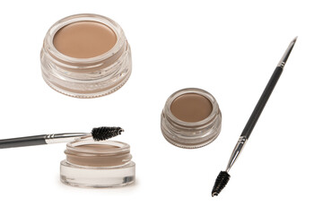A brow pomade in blonde shade with brush isolated on a white background.