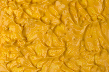 Yellow sauce splashes as a background.