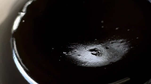 Healthy dessert. A kind of Chinese vegetable jelly black in color, Grass jelly (Mesona chinensis) It's Southeast Asia Dessert made from herb boiling with sugar. Asian cool dessert for healty