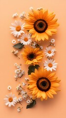 Bright yellow sunflowers and white daisies on a soft orange background in an artistic arrangement