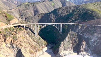 Aerial footage of Bixby Bridge on Highway 1 and Big Sur along Pacific Ocean coast. Bixby Bridge, also known as Bixby Creek Bridge, is a bridge on the Big Sur coast of California.