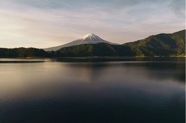 view of mount fuji with water reflection in lake Kawaguchiko Japan.