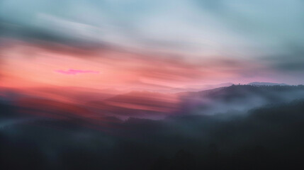 Fototapeta premium A peaceful sunrise over the tea plantations in Munnar, India, with blurred motion of tea leaves swaying in the wind and soft streaking clouds