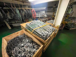 Spare lashing turnbuckles and fixed lashing equipment on board of container ship in forward...