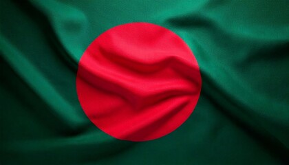 Bangladesh flag waving gently in bright sunlight against a backdrop of fabric