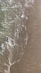 waves and sand