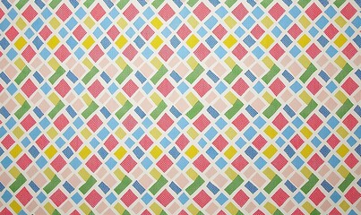Fototapeta premium Colorful diamond pattern on paper, gift wrap use