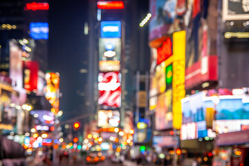 Conceptual image of the famous Times Square at night showcasing its electronic billboards and neon lights.
