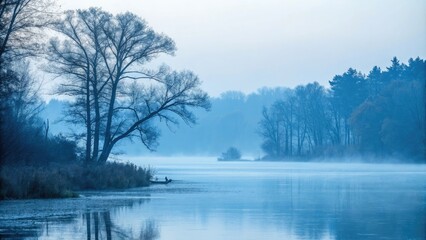 Fototapeta premium - Soft focus landscape with blue misty atmosphere, horizon, depth
