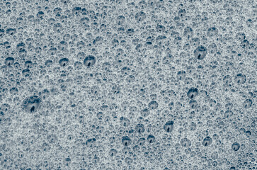 Water bubbles with reflection of person in the bubbles