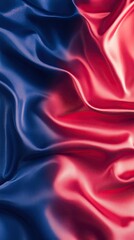Fototapeta premium A red and blue gradient background with a grain effect for texture and depth