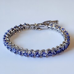 Obraz premium Modern tanzanite tennis bracelet in white gold with geometric settings and high polish finish