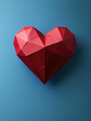 C&Aring;ur rouge en origami isol&Atilde;&copy; sur fond bleu, espace vide pour du texte