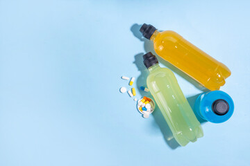 Multivitamin-rich water, healthy drinks with an additional source of vitamins, micro and macro elements, bright drinks bottle with vitamin infused water on a sunny background