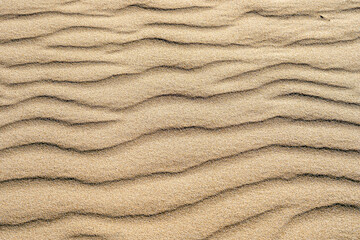 Sand am Strand von Rota in Spanien