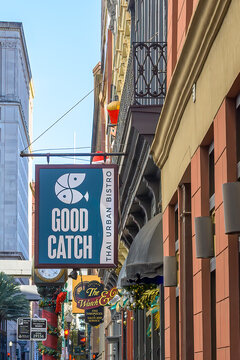 New Orleans, LA, USA - January 2, 2025: Good Catch Thai Urban Bistro amongst Cityscape of Shops in the Central Business District