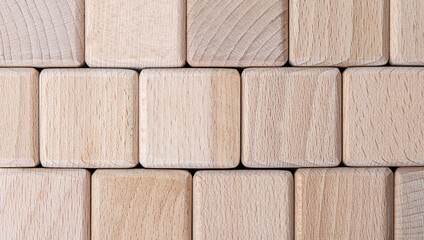 A close-up background of wooden square cubes.