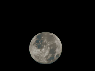 full moon in the dark night sky