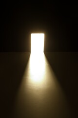 Illuminated doorway casting light and shadows in a dark space, creating a mysterious ambiance and...