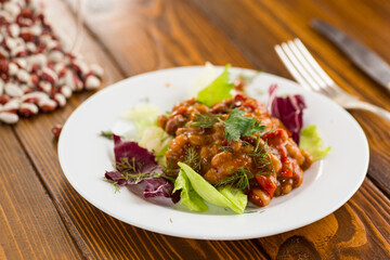 Delicious salad on a rustic table