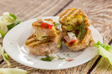 Crispy sandwiches with cheese and herbs