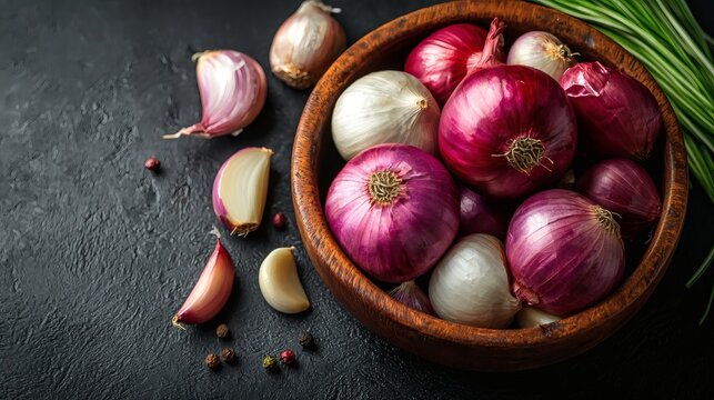 Isolated of onions and garlic cloves combined as essential cooking ingredients Stock Photo with side copy space