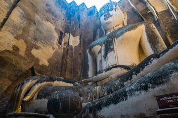 Giant Statue of A Seated Buddha With Tapered Fingers Covered With Gold.Finger of Phra Ajana at Wat...