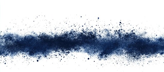 Obraz premium Navy blue abstract powder splatter texture on white background with copy space for design and text placement