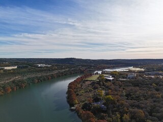 aerial view of lake austin and the pennybacker bridge, plus the west austin hills