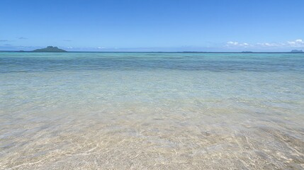 Serene Tropical Beach Scene: Crystal Clear Water and Distant Islands