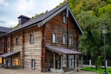 Traditional wooden barn or hut in Siberia, Tall, sturdy structure made of chopped logs