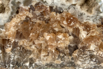 Mineral detail golden pyrite on calcite
