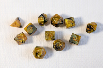 Set of dice for fantasy dnd and rpg tabletop games Board game polyhedral dices with different sides on wood background