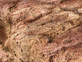 Brown color natural rock. Surface of the stone.