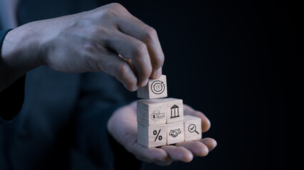 The action plan, corporate strategy development, project management, objective and target, success and business target concept, and stacked woods block step on the table with an icon.