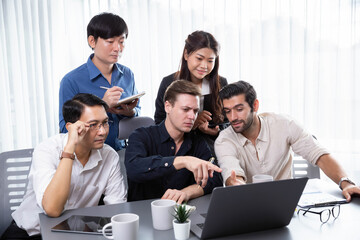 Fototapeta premium Group of diverse office worker employee working together on strategic business marketing planning in corporate office room. Positive teamwork in business workplace concept. Prudent