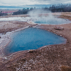 Steaming geothermal pools in Haukadalur Valley, south Iceland, a natural wonder...