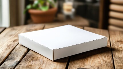 Blank pizza box resting on a rustic wooden table in a cozy setting