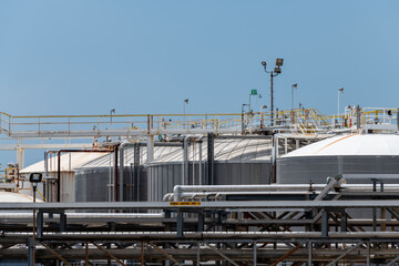 Tanks and pipes at a storage terminal