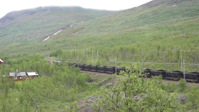 Train on the Malmbanan (ore line) between Kiruna and Narvik, passing Abisko, Lapland, Sweden, in July 2023.